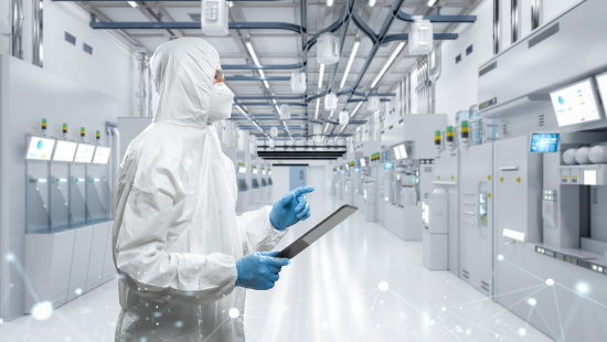 Employee in hazmat suit in data center